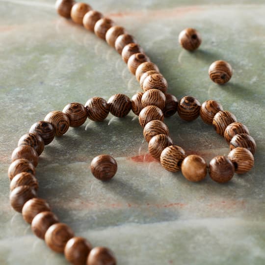 12 Pack: Natural Brown Wood Round Beads, 5.5mm by Bead Landing®